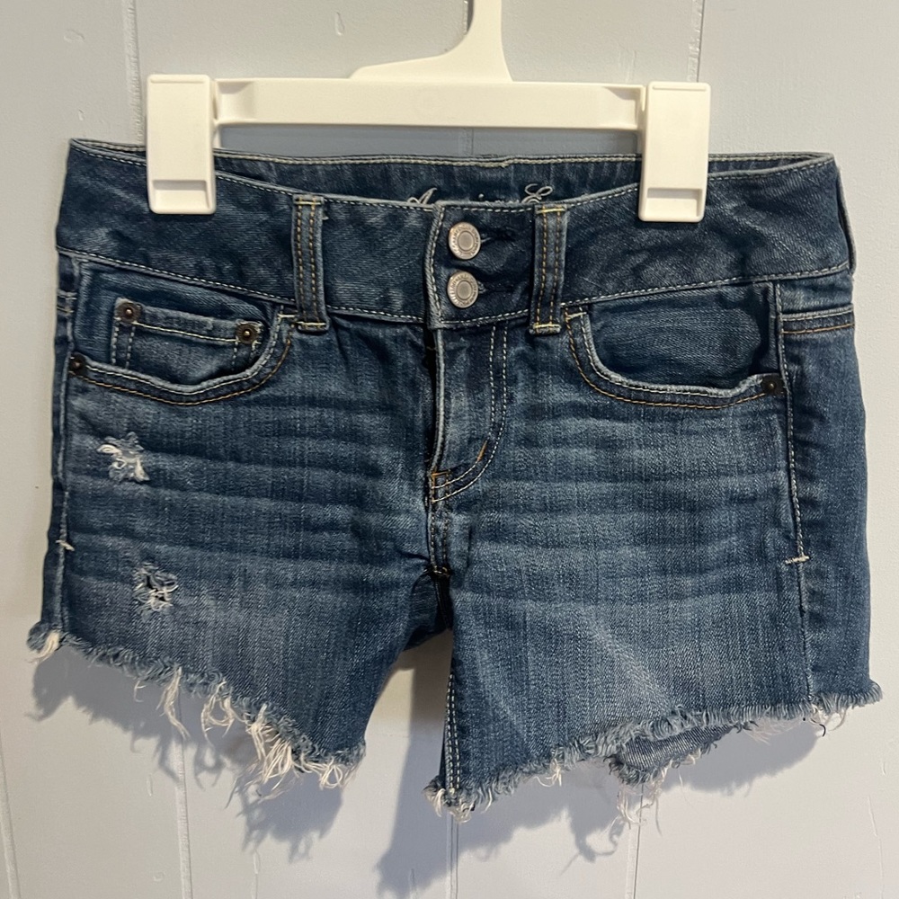 American Eagle stretch midi  low rise denim shorts.